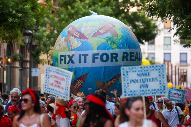 Global South Rises: Protesters Demand Debt Cancellation as UN Summit Confronts 'Broken' Financial System (Seville 2025)